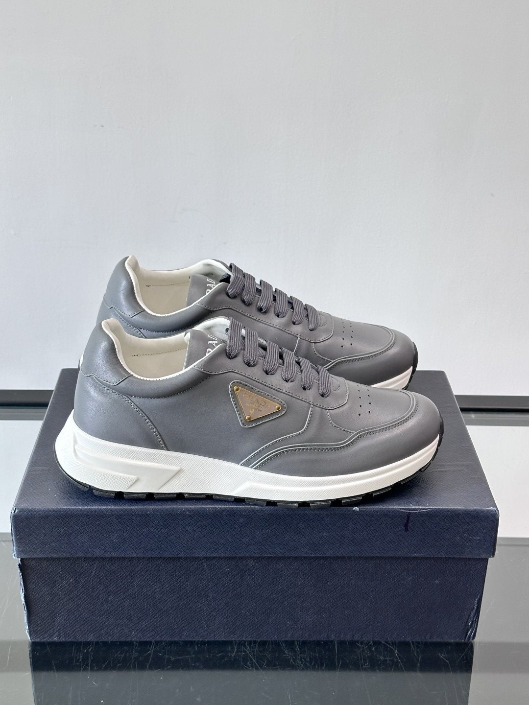 Prada Men's Triangle Plaque Low-Top Sneakers - Thick Lug Sole